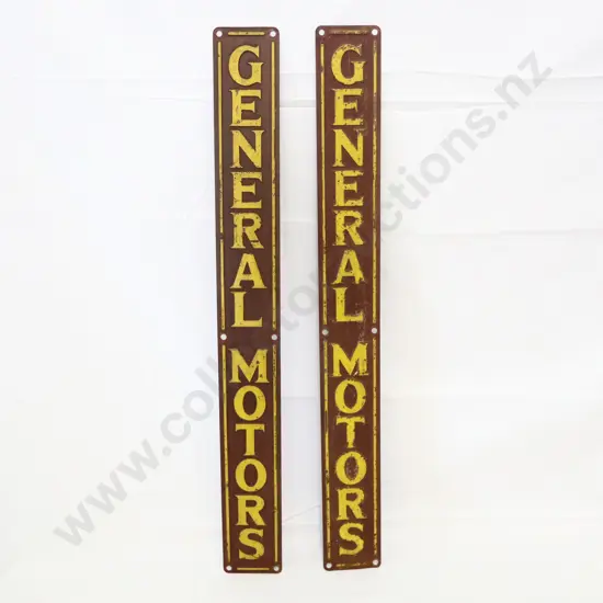 Pair General Motors Embosed Signs