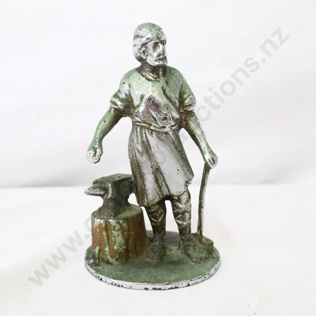 A Vulcan Blacksmith Car Mascot Image 1++