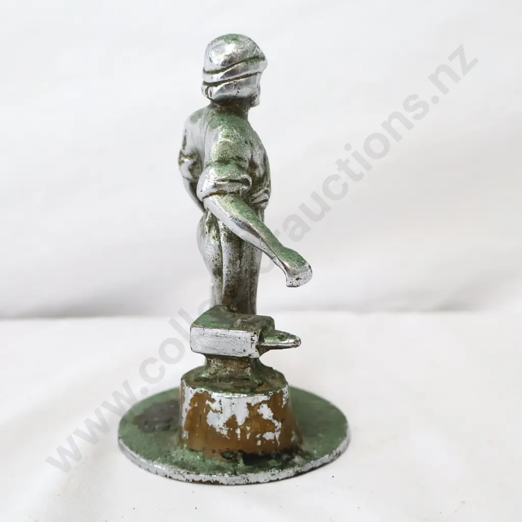 A Vulcan Blacksmith Car Mascot Image 1++
