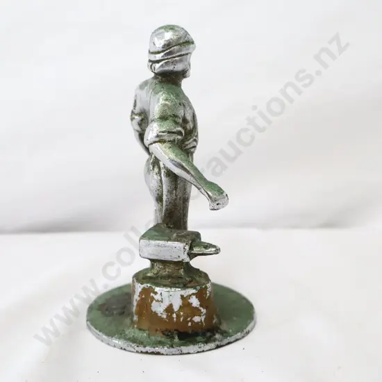 A Vulcan Blacksmith Car Mascot