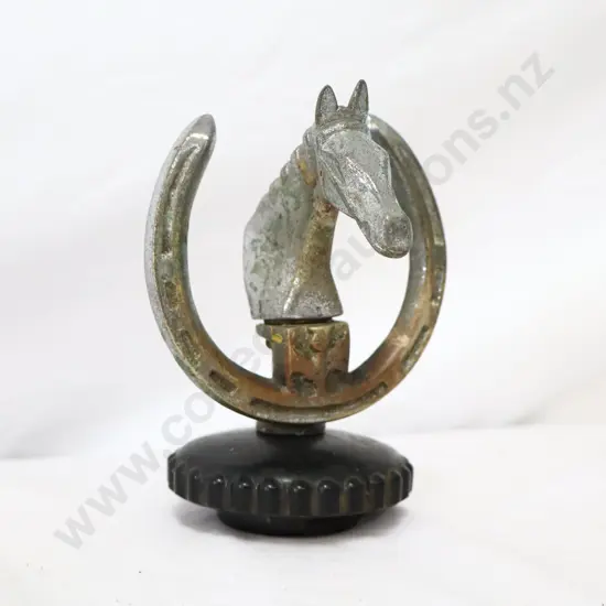 A Horse Themed Car Mascot On Bakelite Radiator Cap
