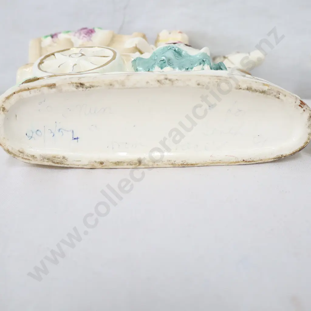 Assorted decorative items   Boy and Girl with wagons , cup & Jug Image 1++