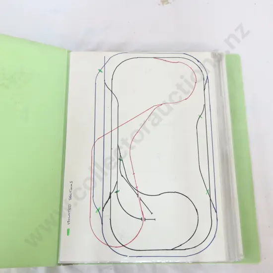 Folder of collected information track layouts and brochures 