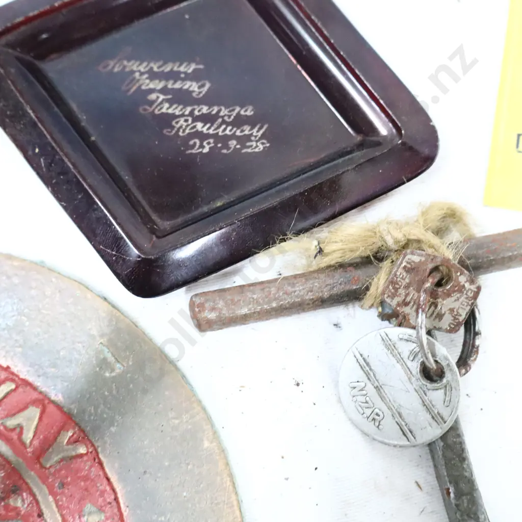 NZR Tile, NZR Carriage Plate, NZR Sign, NZR Key. C1928 Souvenir Opening The Tauranaga Railway. Image 1++